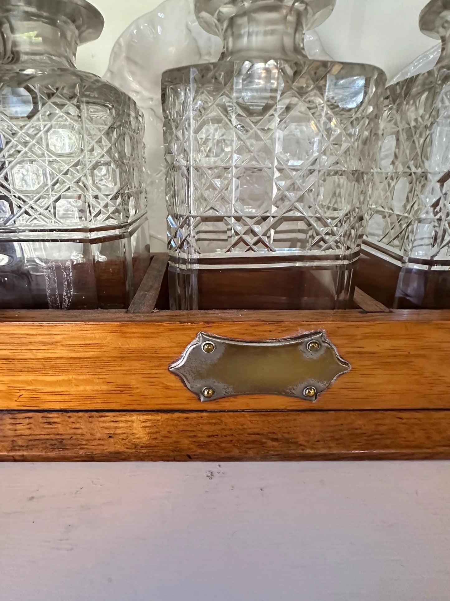 Antique English Oak and Brass Tantalus with Three Cut Glass Decanters