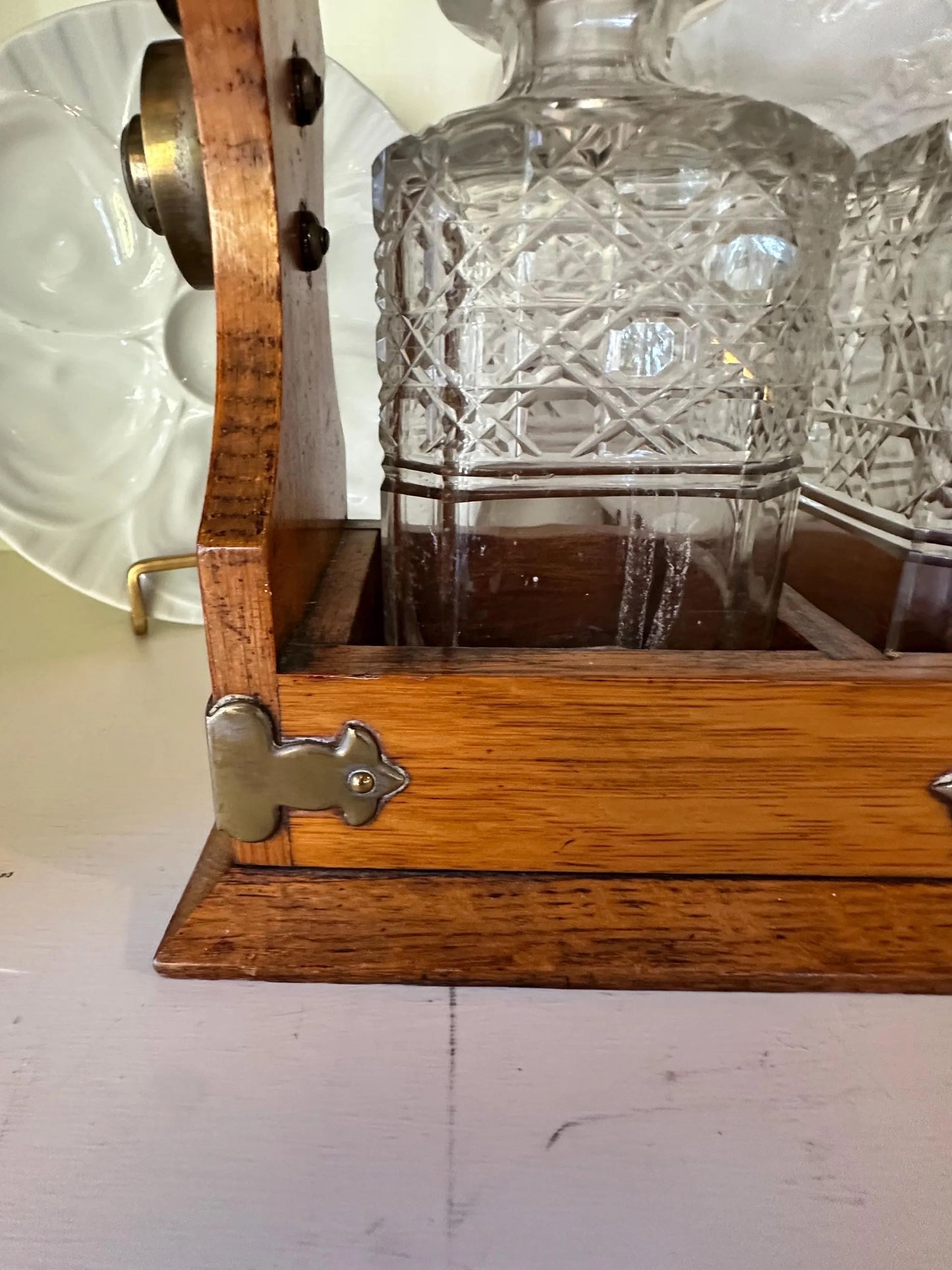 Antique English Oak and Brass Tantalus with Three Cut Glass Decanters