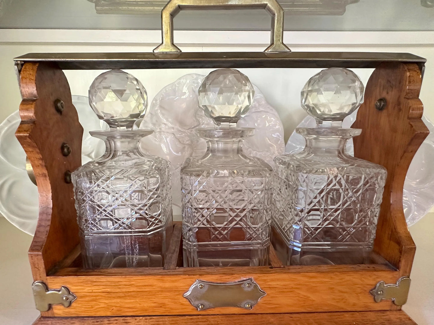 Antique English Oak and Brass Tantalus with Three Cut Glass Decanters